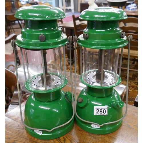 280 - 2 Bialaddin hurricane lamps