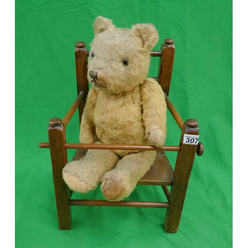 307 - Teddy bear on chair