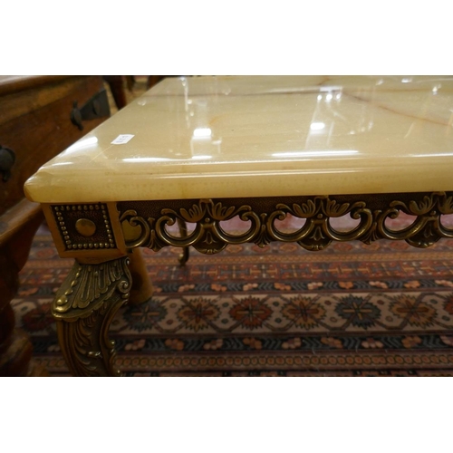 328 - Marble top coffee table with ornate brass frame