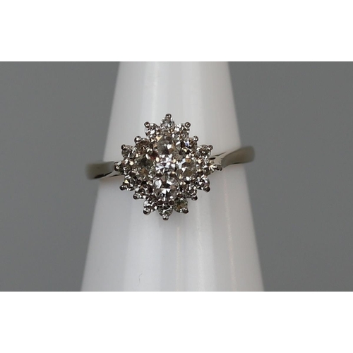 35 - 18ct gold diamond cluster ring - Size J½