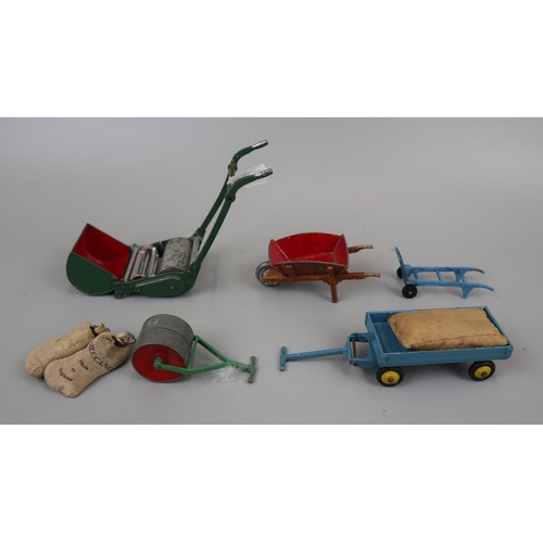 78 - Small collection of vintage Dinky toys to include mower