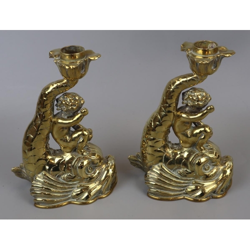86 - Pair of late 19thC brass Putto Cherub on dolphin candlesticks - Approx. H: 18.5cm