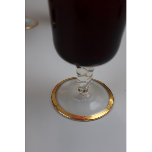 94 - Cranberry glass & gilt lemonade set