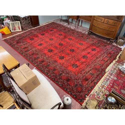 516 - Very large fine quality red patterned rug - Approx 410cm x 300cm