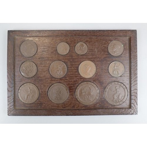 85 - Collection of replica early pennies, cartwheel pennies etc in wooden mount