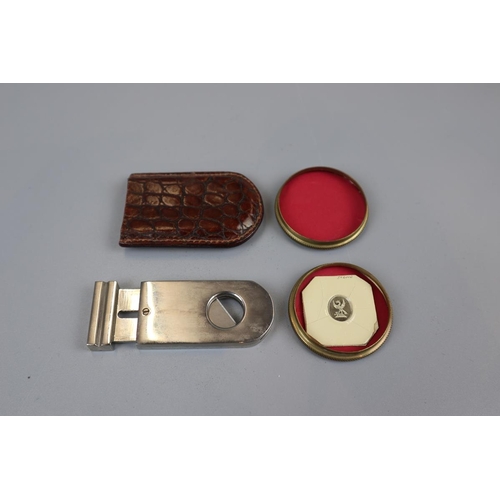 94 - Cigar cutter in leather case & crest set in stone in pill box