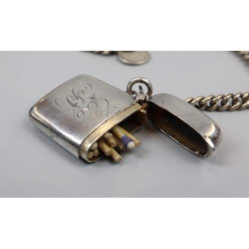 12 - Hallmarked silver vesta case on white metal chain