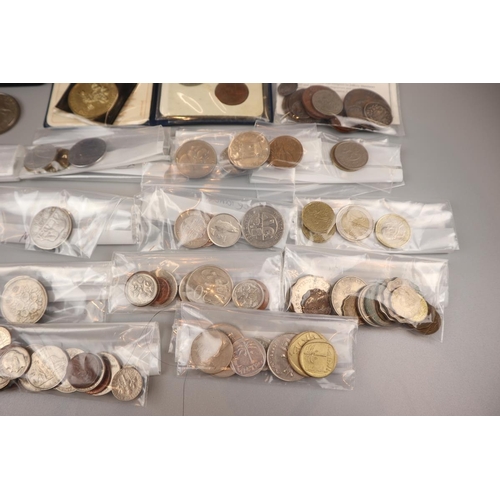 77 - Collection of coins and notes to include Lloyds Bank piggy bank