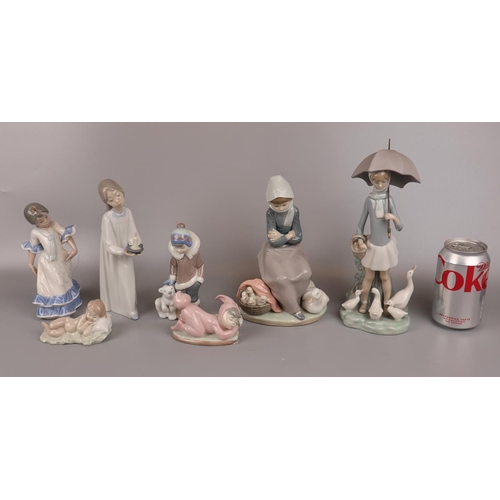 105 - Collection of 7 Lladro figures