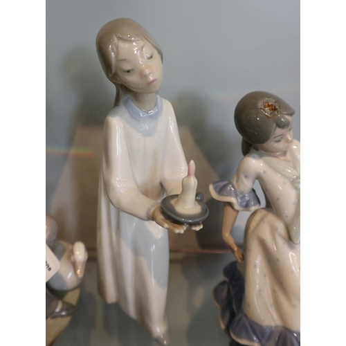 105 - Collection of 7 Lladro figures