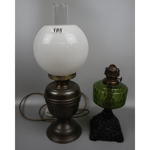 185 - Oil lamp with green glass reservoir and a converted oil lamp