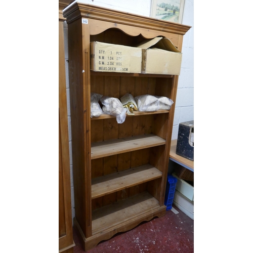 242 - Large pine bookcase - Approx. W:98cm D:35cm H:193cm