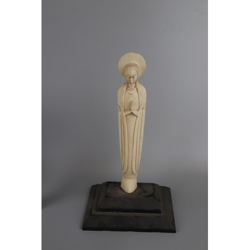 32 - Selection of ivory to include Virgin Mary figure etc