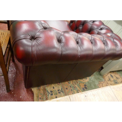 352 - Oxblood leather Chesterfield armchair