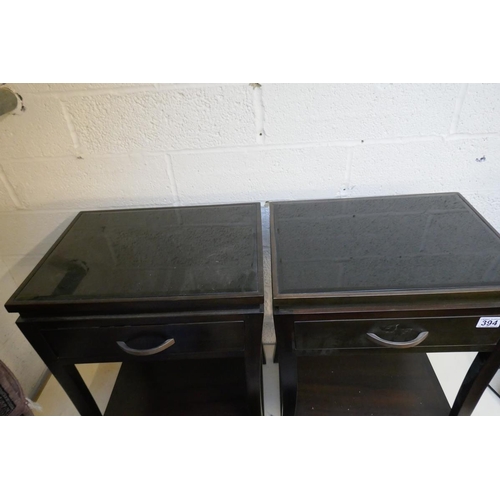 394 - Pair of bespoke dark stained hardwood bedside tables with curved legs and black glass tops - Approx.... 