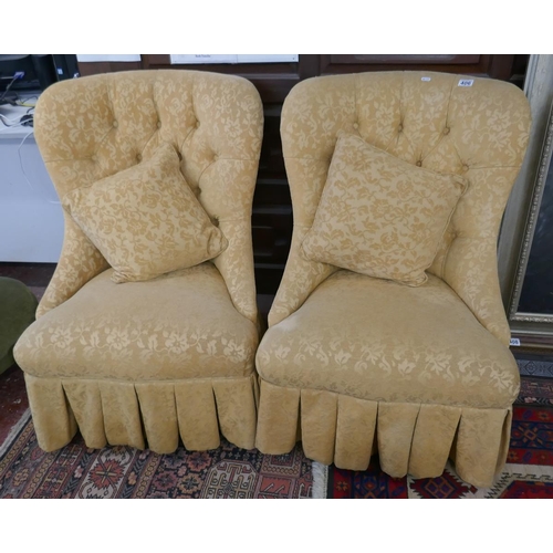 406 - Pair of yellow button back nursing chairs