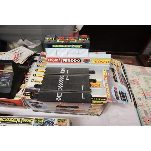 51 - Scalextric toys, Wembley board game and Millionaire board game