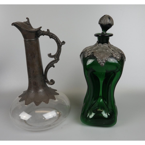 68 - Danish Holmegaard green glass decanter and another, both with pewter overlay