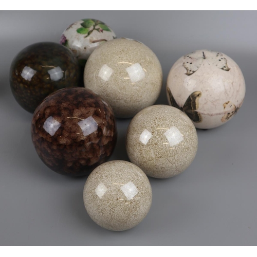 80 - Collection of 7 ceramic spheres