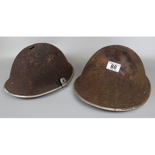 88 - 2 British military turtle helmets