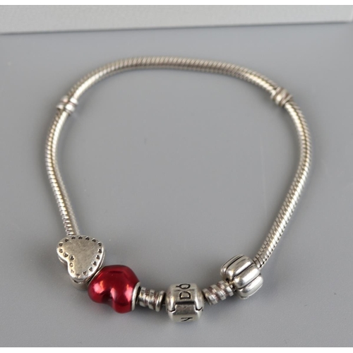 103 - Pandora Bracelet and three charms