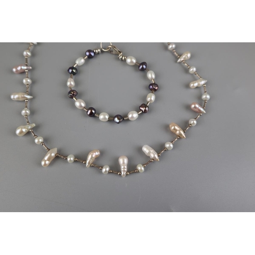 110 - Silver and pearl necklace and bracelet