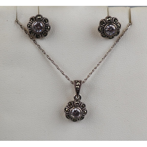 112 - Silver crystal earrings and necklace