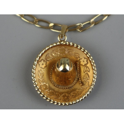 115 - 14ct gold sombrero pendant on 14ct gold chain - Approx 20g