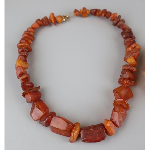 125 - Natural amber necklace with gold clasp, honey amber bracelet and a rustic amber necklace