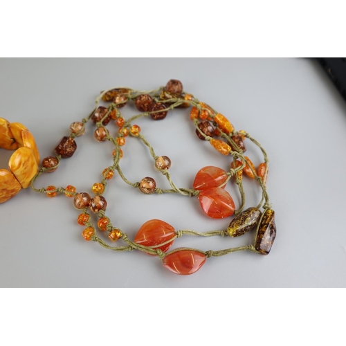 125 - Natural amber necklace with gold clasp, honey amber bracelet and a rustic amber necklace