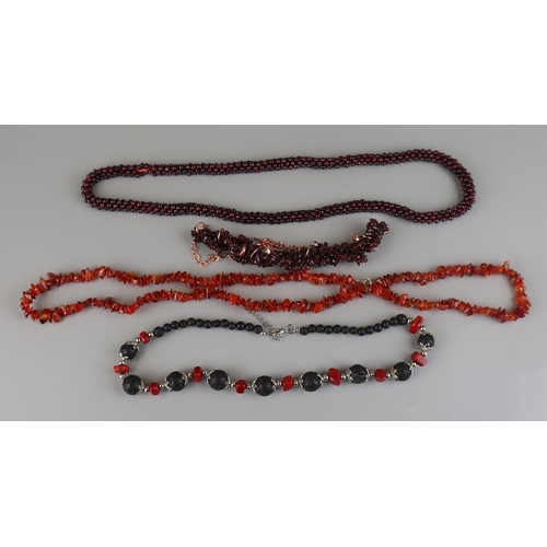 127 - 2 garnet necklaces and 2 carnelian necklaces