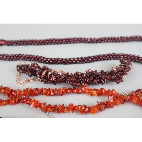 127 - 2 garnet necklaces and 2 carnelian necklaces