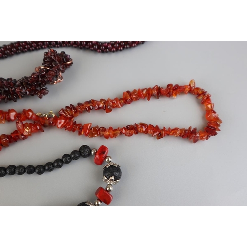 127 - 2 garnet necklaces and 2 carnelian necklaces