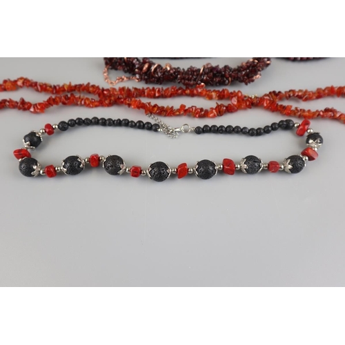 127 - 2 garnet necklaces and 2 carnelian necklaces