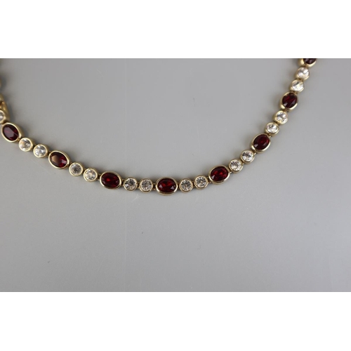 129 - Vintage gilt red and diamante necklace