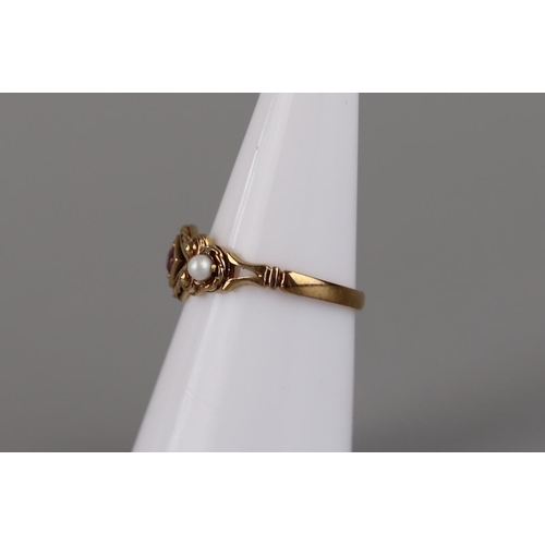 138 - Gold garnet and seed pearl ring - Size M