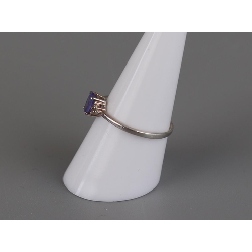 139 - Silver tanzanite and diamond ring - Size P½