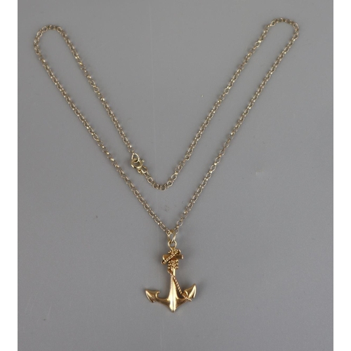 146 - Gold chain with a yellow metal anchor sweetheart pendant