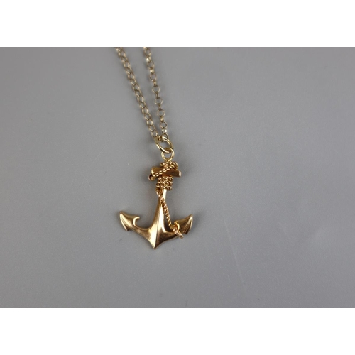 146 - Gold chain with a yellow metal anchor sweetheart pendant