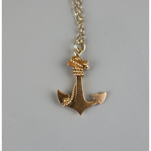 146 - Gold chain with a yellow metal anchor sweetheart pendant