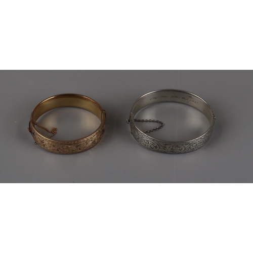 155 - 2 bangles, 1 with Birmingham silver hallmark, the other marked 1/5 9ct metal core