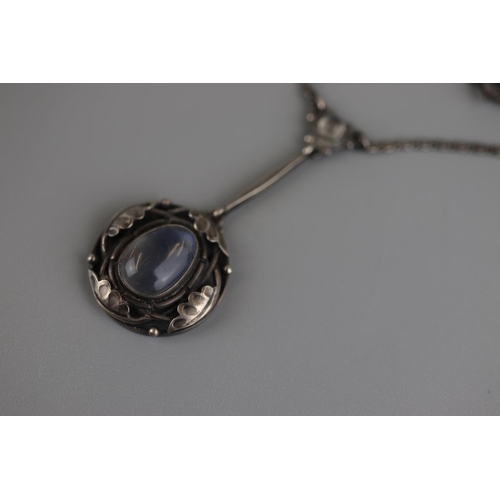 165 - Antique silver & moonstone Art Nouveau pendant on chain