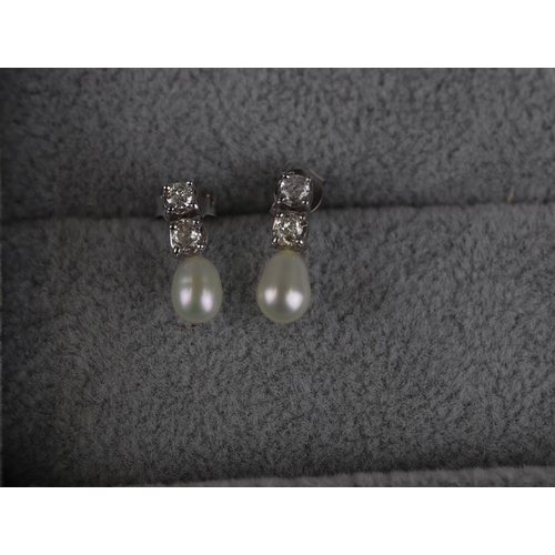 166 - Pair of 18ct gold pearl & diamond earrings