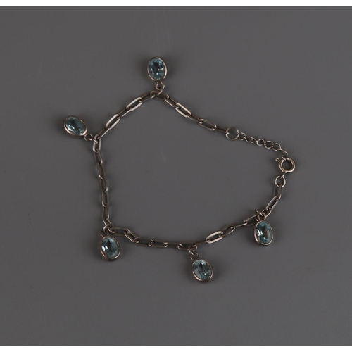 176 - Silver & blue topaz bracelet