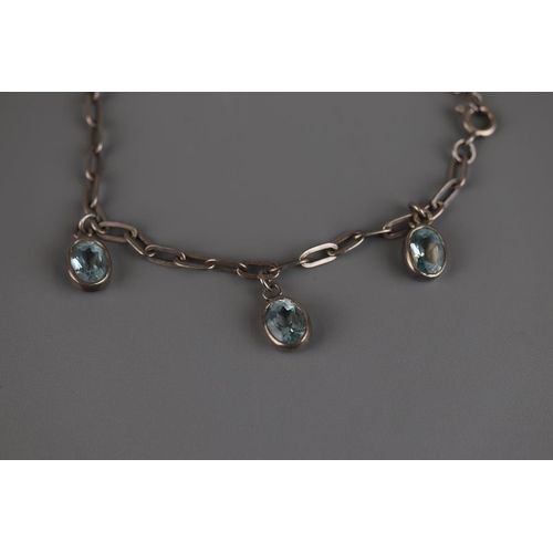 176 - Silver & blue topaz bracelet