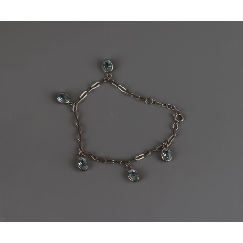 176 - Silver & blue topaz bracelet