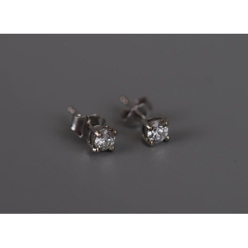 183 - Pair of 18ct white gold diamond stud earrings