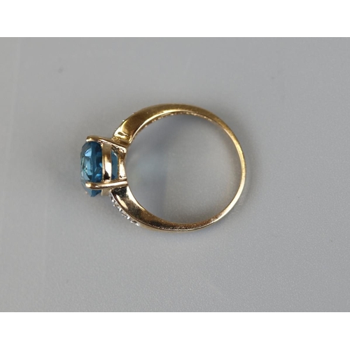 33 - Gold blue topaz & diamond ring - Approx size N