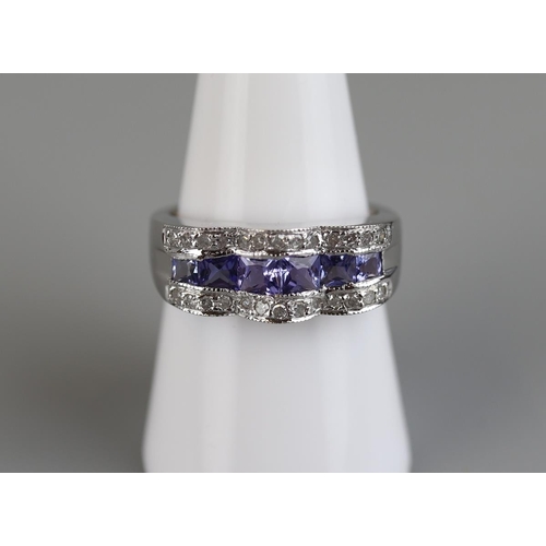 95 - 18ct white gold tanzanite & diamond ring - Approx size P