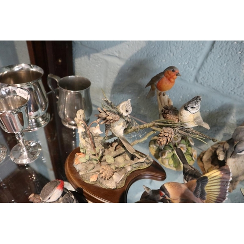 117 - Large collection of ornamental bird figures